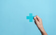 © Kiattisak - Health insurance concept. people hands holding plus and healthcare medical icon, health and access to welfare health concept.