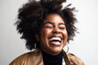 © Trinette Reed - Portrait of young black curvy joyful woman laughing in studio. Generative AI.