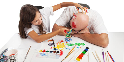 Wall Mural - Painting concept. Schoolgirl painting with father during therapy at home with his tutor with learning and having fun together.