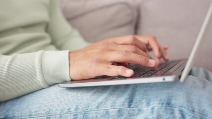 Poster - Closeup, man hands and laptop on sofa for typing, email communication or seo for social media. Male, computer and work from home for web design, internet and website development in living room