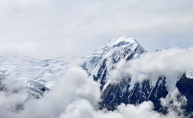 view of gangapurna mountain in clouds. himalaya mountains, annapurna circuit trek, manang district, 