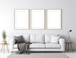 © Sönke Hayen - Leeres Bilderrahmen mocku auf weißer Wand. Moderne Wohnzimmergestaltung. modernes Interieurs im skandinavischen Stil mit Sofa. Drei Vorlagen für Kunstwerke, Gemälde, Fotos oder Poster, generative AI