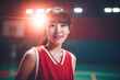 © Surachetsh - Basketball girl, an Asian sportswoman in red sportswear at a Basketball court with Highlight on her. generative AI