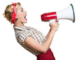 © BillionPhotos.com - 1950s style housewife yelling into a megaphone - isolated image