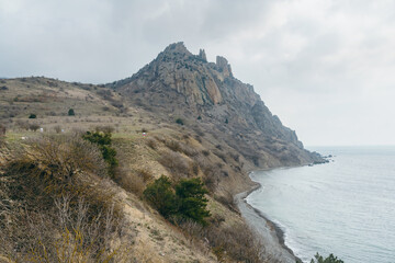 Wall Mural - View of the crest of the coastal ridge Karagach in spring. Karadag Reserve. Crimea