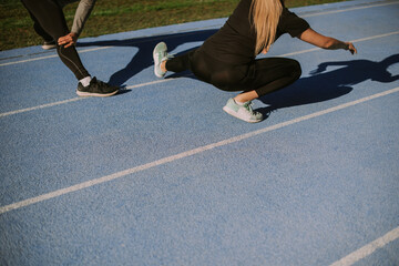 Wall Mural - Sports people warming up