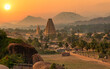 Virupaksha temple with scenic Hampi landscape and cityscape at sunset at Karnataka India