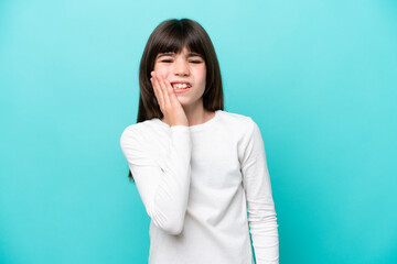 Canvas Print - Little caucasian girl isolated on blue background with toothache