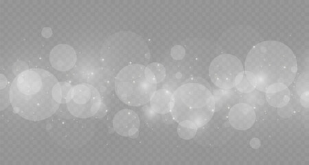 dust sparks and stars shine with a special light. christmas light effect. glittering particles of ma