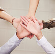 © M Bam/peopleimages.com - Teamwork, palm and hands stacked for support, collaboration or team building mission from below. Group, circle or business people with together hand sign for community goals or professional workflow