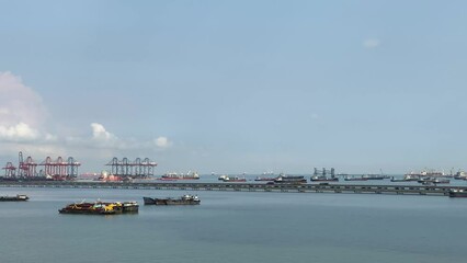 Wall Mural - Aerial view of a container terminal in the import-export business industry in Sriracha Industrial Port, Chonburi, Thailand.