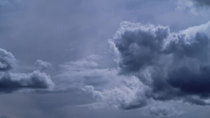 Wall Mural - Scenic view of fluffy clouds in the sky during daytime