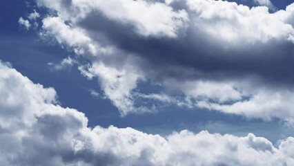 Wall Mural - Scenic view of fluffy clouds in the sky during daytime