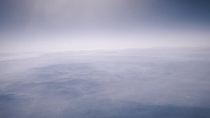 Wall Mural - Aerial view of a breathtaking vast landscape stretching to the horizon under the cloudy atmosphere