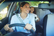 © Nina/peopleimages.com - Travel, mother and child in car for drive, fun and sports, soccer and adventure, happy and excited. Mom, driver and girl passenger in vehicle, smile and bonding on road trip to football activity