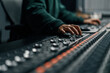 © Guys Who Shoot - Sound engineer used digital audio mixer Sliders Engineer presses keys Control panel Recording studio technician