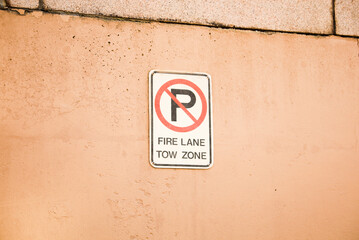 Wall Mural - no parking sign typically represents rules, regulations, and restrictions. It is a symbol of order and control in public spaces, and the need to maintain safety and accessibility