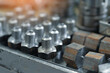 © SerPak - These are close-up metal fittings and adapters. Production of adapters for pipes in turning workshop..