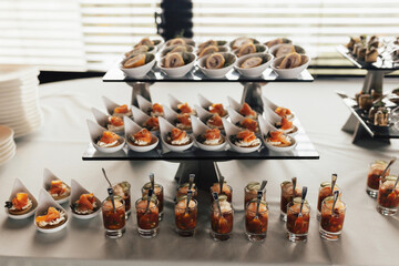 Wall Mural - Holiday buffet table served by different snacks ready for eating in restaurant