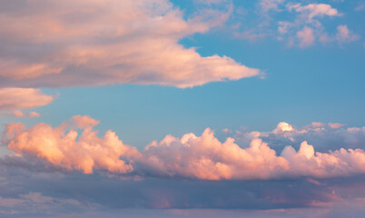 Wall Mural - Beautiful evening sky with clouds glowing at sunset