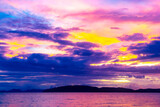 Fototapeta Niebo - Beautiful stunning colorful and golden sunset Ao Nang Beach Thailand.