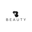 Elegant letter B logo with a silhouette of beautiful African woman wearing headwrap that stands for beauty - color is editable