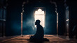Silhouette of muslim male praying in old mosque. Generative AI.