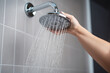 A person using a low-flow showerhead, Earth Day Generative AI
