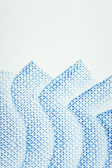 Poster - frottage technique featuring a grid or net pattern on tracing paper and photographed on a white backlit surface