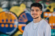 © carballo - portrait young urban man smiling at camera