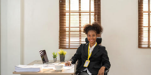 Sticker - Accountant black woman working on laptop and do document, tax, exchange, accounting and Financial advisor concept