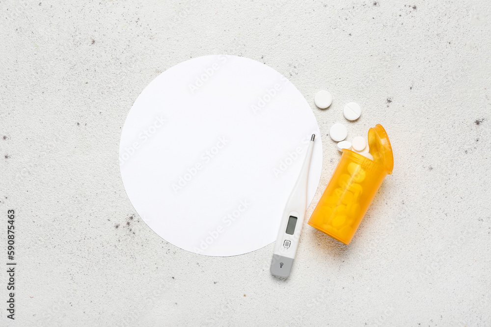 Blank card, jar with pills and thermometer on light background. Melanoma concept