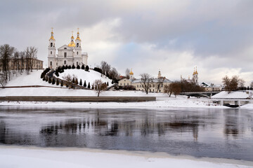 Wall Mural - Assumption Mountain, the Holy Spirit Monastery and the Holy Assumption Cathedral on the banks of the Western Dvina and Vitba rivers on a sunny winter day, Vitebsk, Belarus