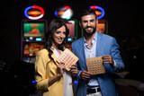 Fototapeta Tulipany - Portrait of a Young Couple in Casino