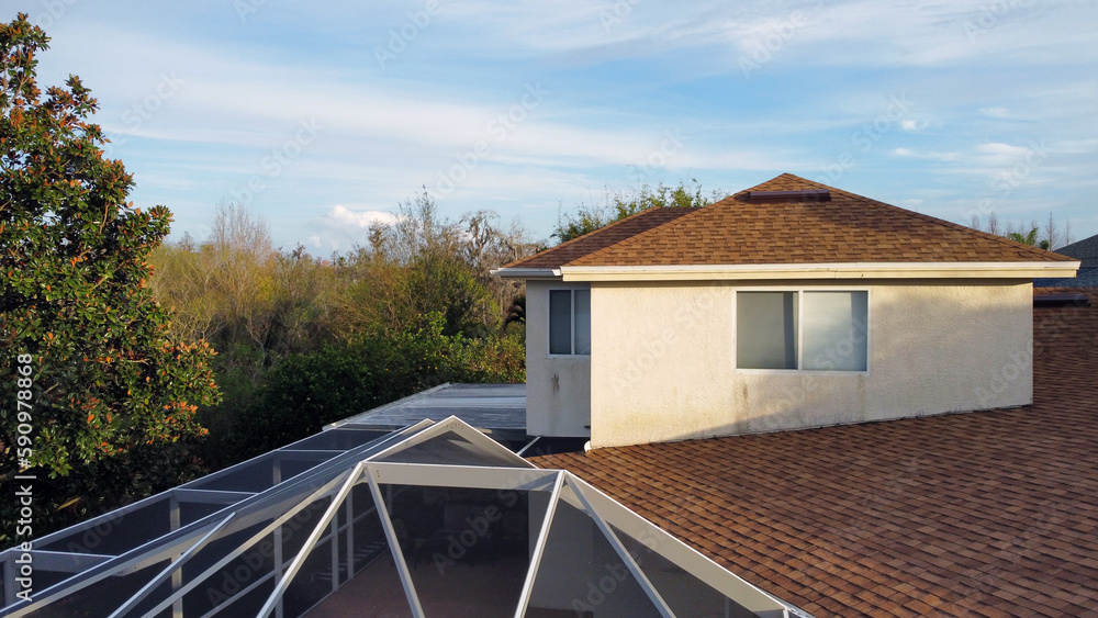 Aerial drone image of Florida residential house roof and second floor ...