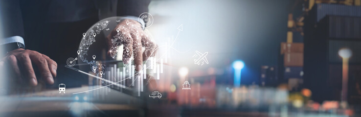 Global business and smart logistic concept. Businessman using digital tablet with global logistic network and financial graph growth chart, distribution and transportation, business growth