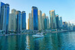 © Liubov - Dubai Marina in Dubai, UAE. View of the skyscrapers and the canal