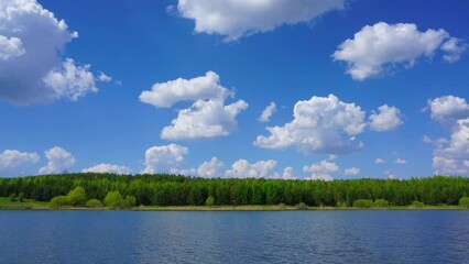Wall Mural - clouds are reflected in smooth water of lake, zoom in timelapse, 4k