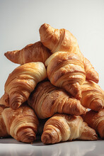Close Up Of Pile Of Delicious Croissants On White Background. Generative AI Technology