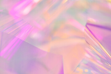Poster - Blurred closeup of ethereal pastel neon pink, purple, lavender, orange, yellow holographic metallic foil background. Abstract modern surreal futuristic disco, rave, techno, festive dreamlike backdrop