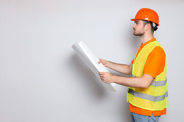 Wall Mural - Young man civil engineer in safety hat