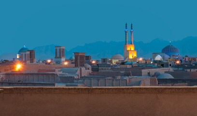 Wall Mural - Historic city of Yazd with famous wind towers at dusk - YAZD, IRAN