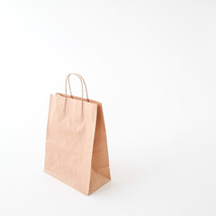  The craft package is on a white background. Space for text and logo. The concept of delivery, food, packaging, gift.