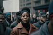 © GVS - African American young woman standing in crowd of protesting people. Generative AI