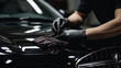 © Volodymyr Skurtul - Shoot of a male hands carefully polishing his car with a microfiber cloth