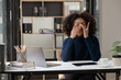 © Thitisak - Asian woman sitting stressed with being an office worker