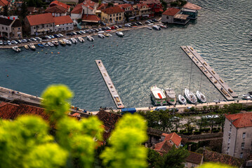 Wall Mural - View of the old town of Kotor and the port with boats. Travel to Montenegro