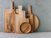 Kitchen Utensils Background With Set Of Wooden Cutting Boards, Copy Space