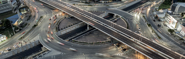 Expressway top view, Road traffic an important infrastructure, Drone aerial view fly in circle, traffic transportation, Public transport or commuter city life concept of economic and energ, transport.