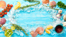 Seafood Background: Salmon, Tuna, Caviar, Oysters, Dorado Fish And Shellfish On A Blue Wooden Background. Top View. Seafood.